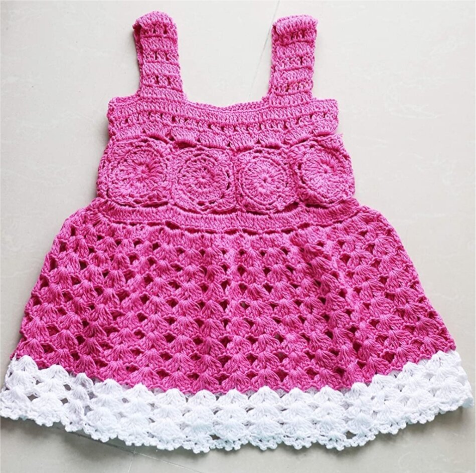 Crochet peach baby dress set with colorful trim